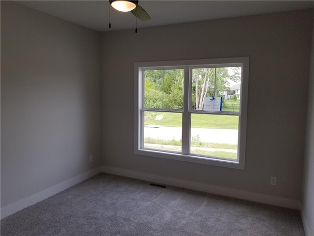 4576 Aspen Dr, Basehor, KS 66007 - empty room featuring carpet flooring and a ceiling fan
