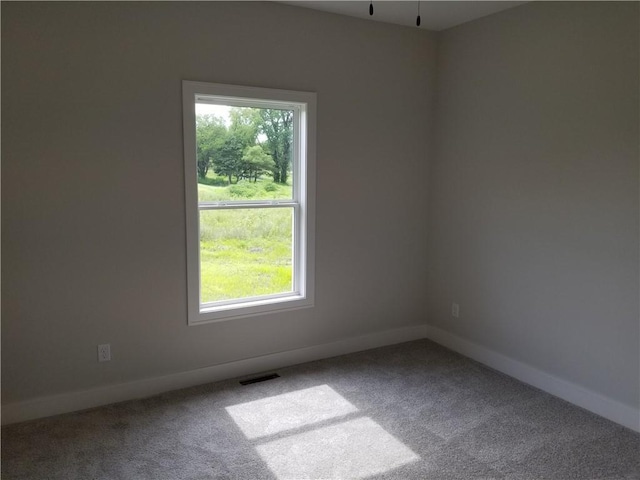4576 Aspen Dr, Basehor, KS 66007 - carpeted spare room featuring healthy amount of natural light