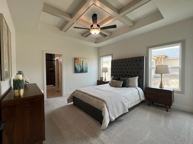 bedroom featuring multiple windows, carpet floors, and coffered ceiling