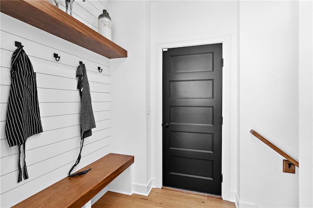 mudroom with light hardwood / wood-style floors