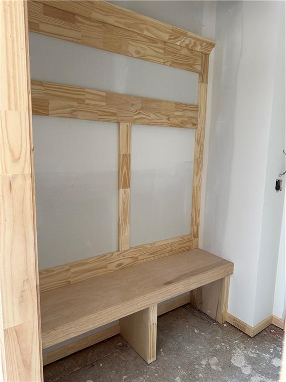 mudroom featuring baseboards
