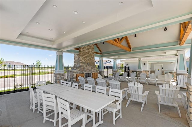 view of patio / terrace with an outdoor stone fireplace