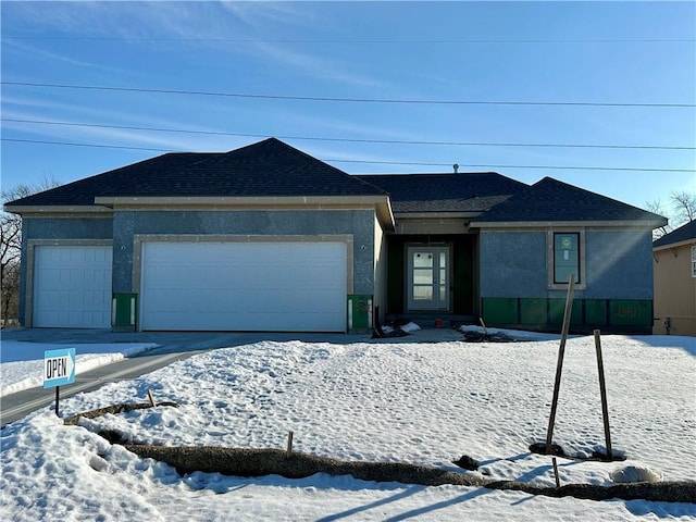 view of front of home featuring a garage