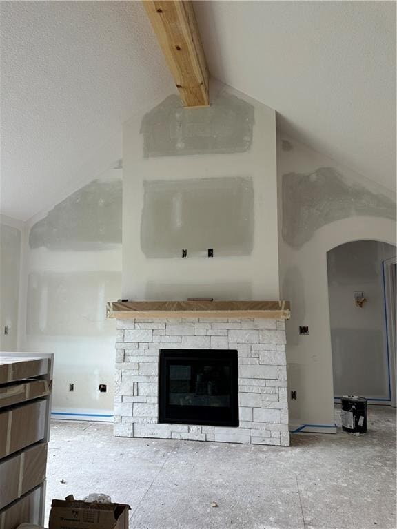 24811 W 178th Ct, Gardner, KS 66030 - detailed view of a stone fireplace, beamed ceiling, and arched walkways