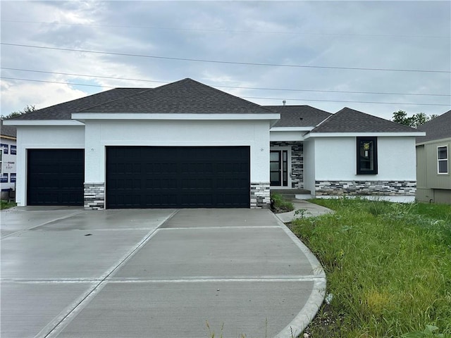 24811 W 178th Ct, Gardner, KS 66030 - view of front facade with an attached garage, concrete driveway, stone siding, and stucco siding