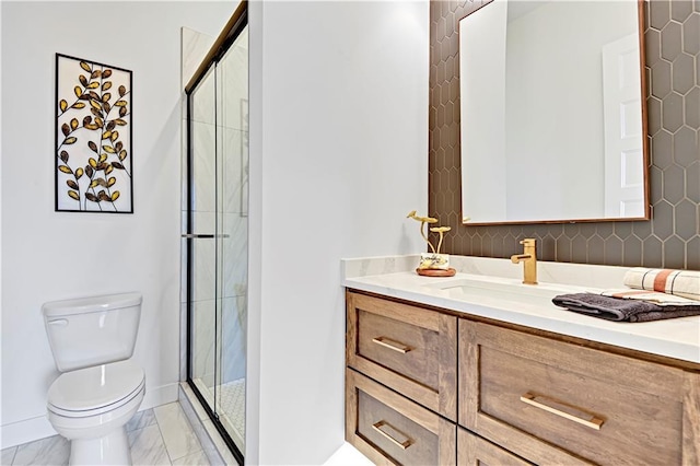 17433 Gillette St, Overland Park, KS 66221 - bathroom with toilet, vanity, marble look tile flooring, and a shower stall