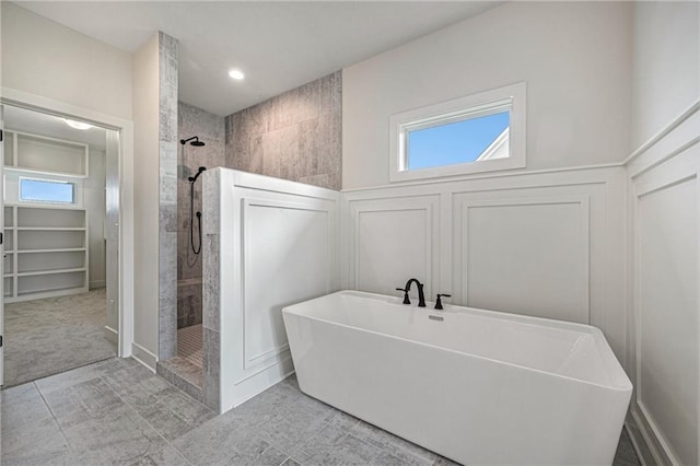 bathroom with separate shower and tub