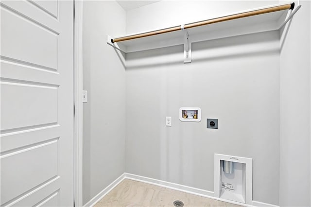 clothes washing area with hookup for an electric dryer and hookup for a washing machine