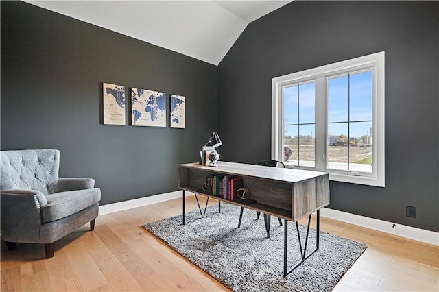 17421 Gillette St, Overland Park, KS 66221 - home office featuring lofted ceiling, light wood-style flooring, and baseboards