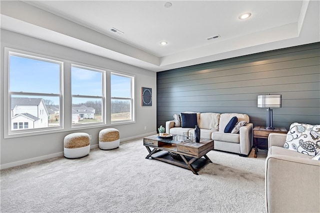 17421 Gillette St, Overland Park, KS 66221 - living area with baseboards, recessed lighting, carpet floors, and wooden walls