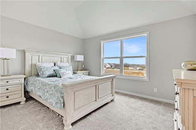 17421 Gillette St, Overland Park, KS 66221 - bedroom featuring lofted ceiling, baseboards, and light carpet