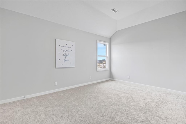 17421 Gillette St, Overland Park, KS 66221 - carpeted spare room featuring baseboards and lofted ceiling