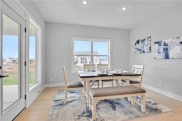17421 Gillette St, Overland Park, KS 66221 - dining area with plenty of natural light, light wood finished floors, recessed lighting, and baseboards