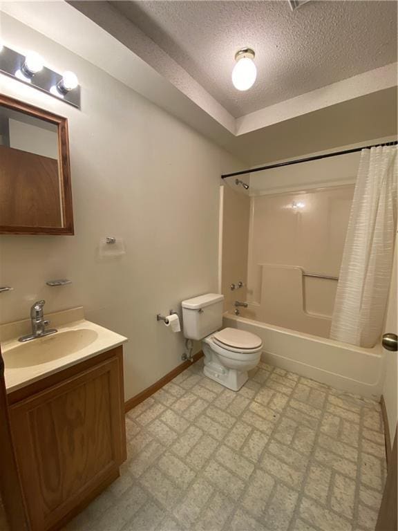 full bathroom featuring shower / tub combo, toilet, tile patterned floors, a textured ceiling, and vanity