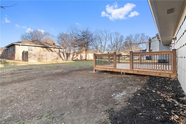 view of yard featuring a wooden deck