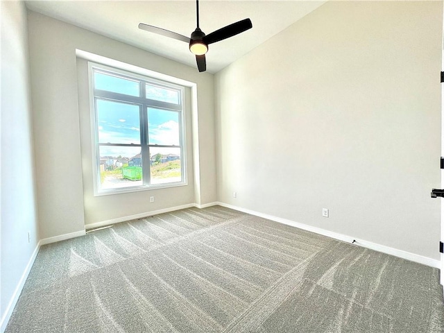 unfurnished room featuring carpet floors and ceiling fan