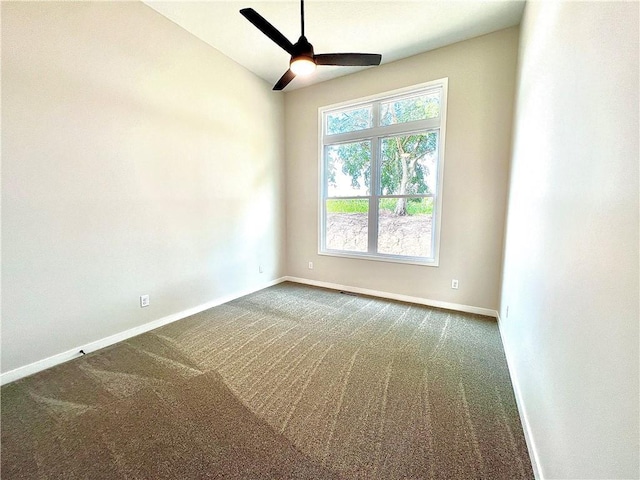 empty room with carpet floors and ceiling fan