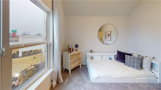 carpeted bedroom featuring vaulted ceiling