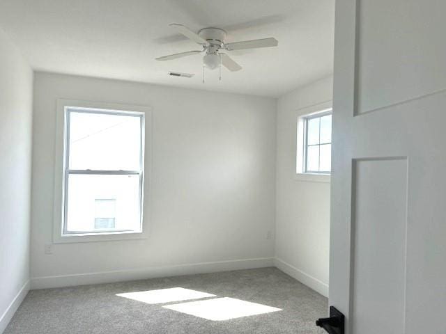 29613 W 196th St, Gardner, KS 66030 - empty room featuring baseboards, a ceiling fan, and light carpet