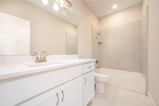 full bathroom with toilet, tiled shower / bath combo, and vanity