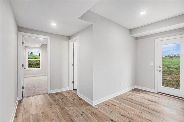 unfurnished room featuring light hardwood / wood-style flooring