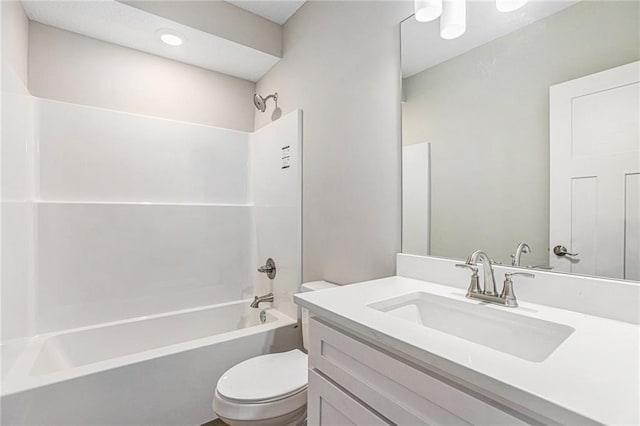 full bathroom with vanity, toilet, and bathtub / shower combination