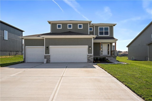 view of front of home featuring a garage, a front lawn, and covered porch