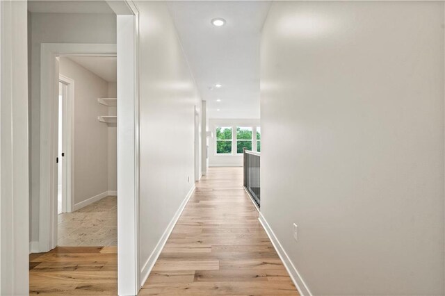 hallway featuring light hardwood / wood-style flooring