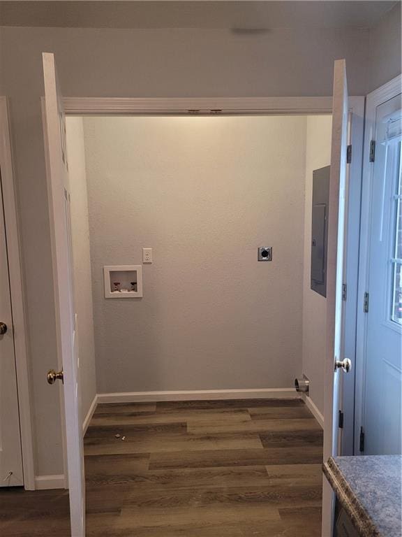 clothes washing area with hookup for an electric dryer, dark wood-type flooring, and hookup for a washing machine