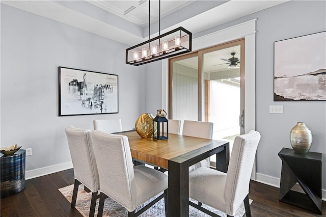 dining space with dark hardwood / wood-style floors, ceiling fan, and ornamental molding