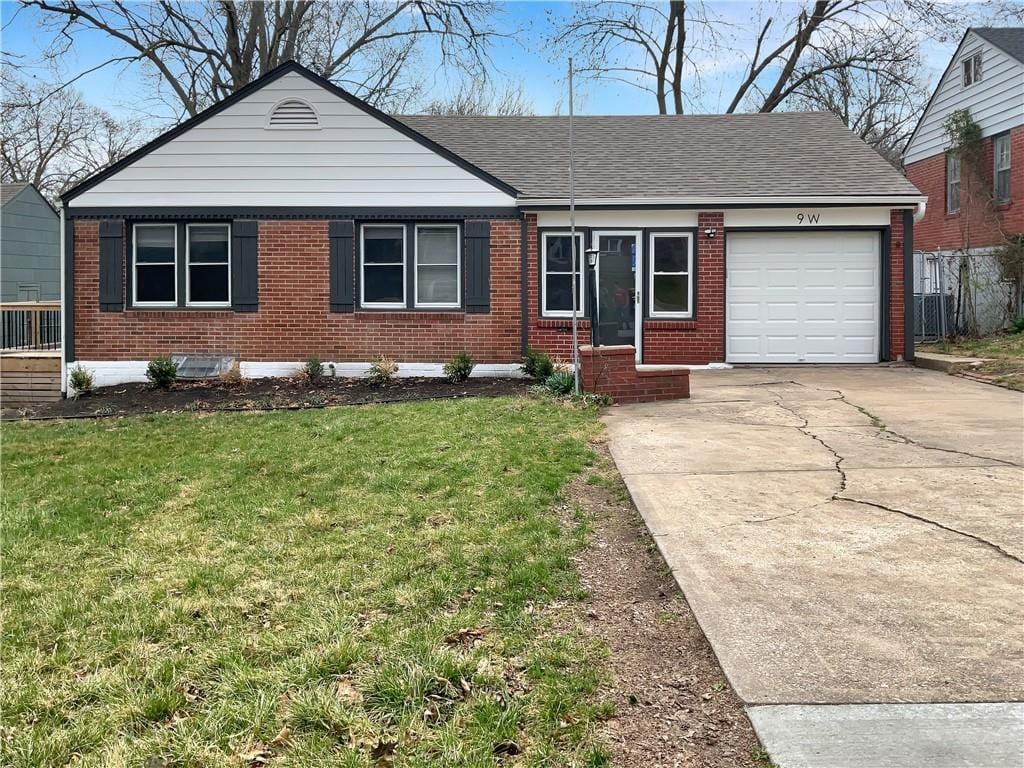 ranch-style house with a front lawn