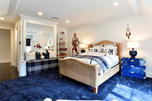 bedroom with crown molding and dark hardwood / wood-style floors