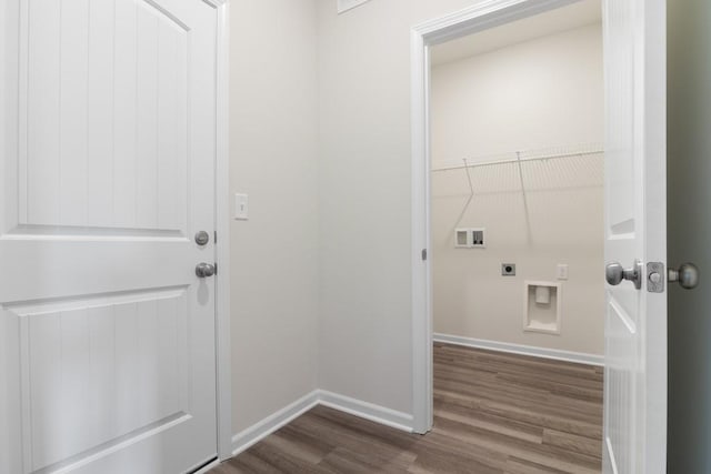 laundry area featuring hookup for an electric dryer, dark wood-type flooring, and hookup for a washing machine