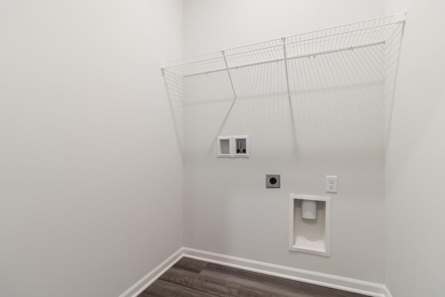 laundry room with dark wood-type flooring, hookup for an electric dryer, and hookup for a washing machine