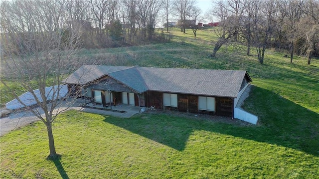 ranch-style home with a front yard