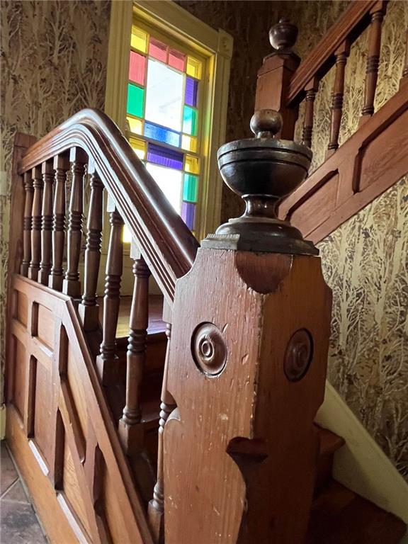 staircase with tile floors