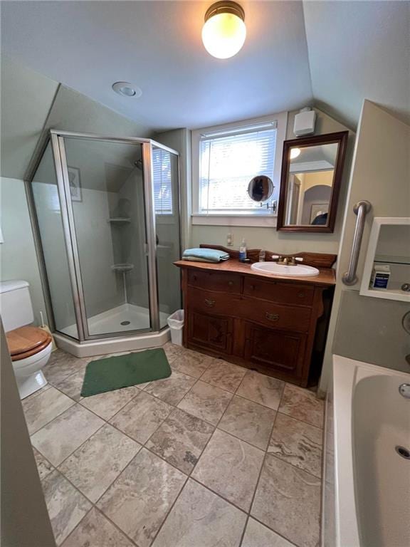 bathroom with vanity, lofted ceiling, tile flooring, toilet, and a shower with shower door