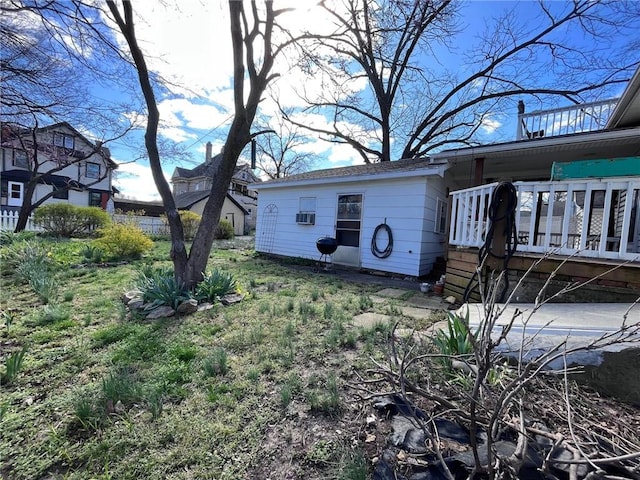 view of yard featuring a wooden deck