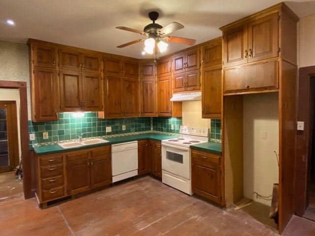 kitchen featuring ceiling fan, white appliances, tasteful backsplash, and sink