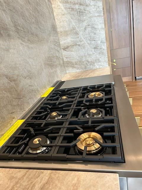 room details featuring black gas cooktop