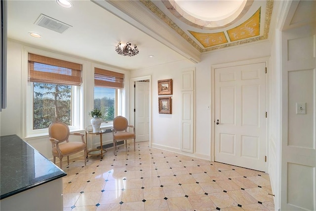 entryway with crown molding