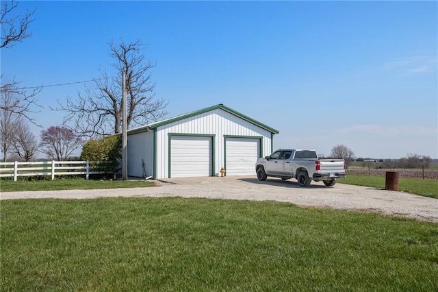 garage with a yard