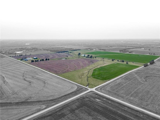 birds eye view of property featuring a rural view