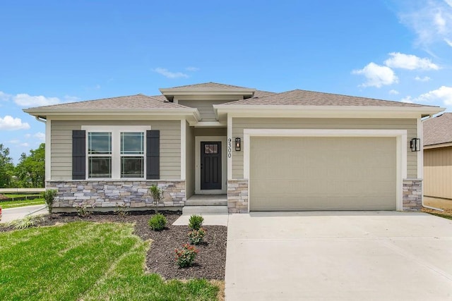 prairie-style home with stone siding, driveway, and an attached garage