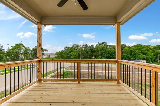 wooden terrace with ceiling fan