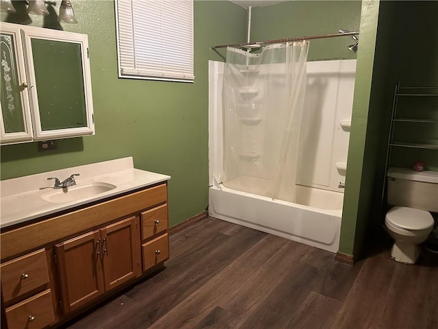 full bathroom featuring shower / bathtub combination with curtain, wood-type flooring, vanity, and toilet