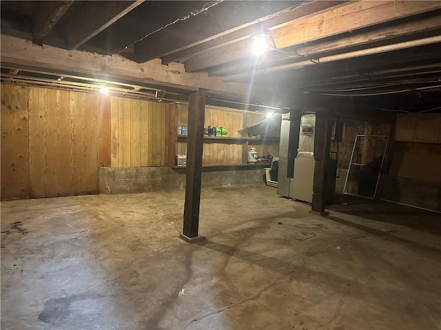 basement with wooden walls