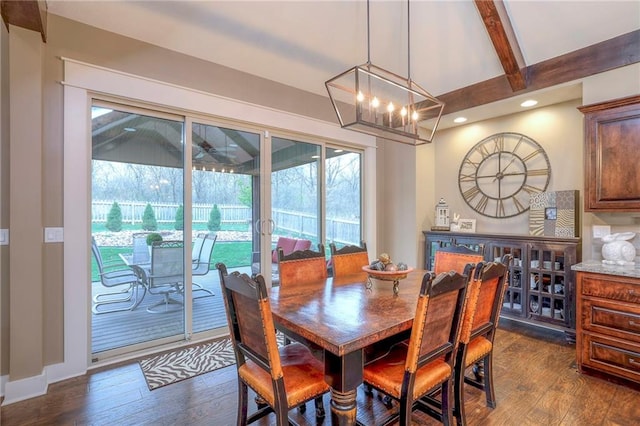 dining space featuring dark hardwood / wood-style floors, lofted ceiling with beams, and a notable chandelier