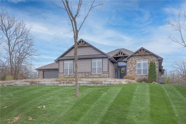 craftsman inspired home with cooling unit, a garage, and a front lawn