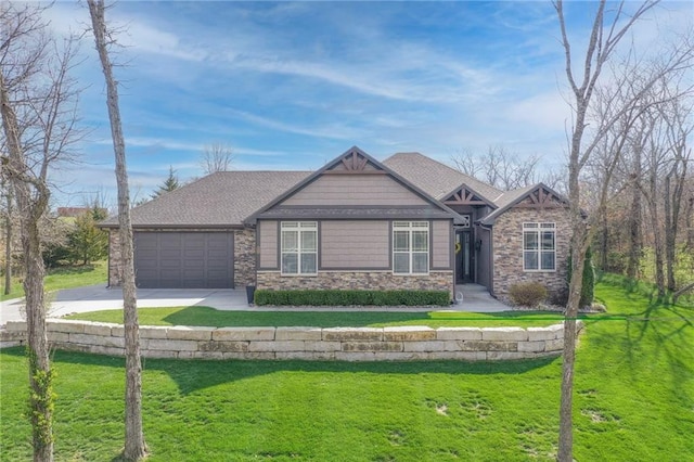 craftsman house with a garage and a front lawn